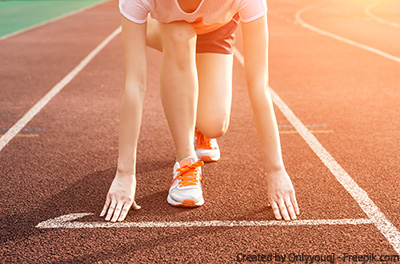 Sportler auf der Tartanbahn